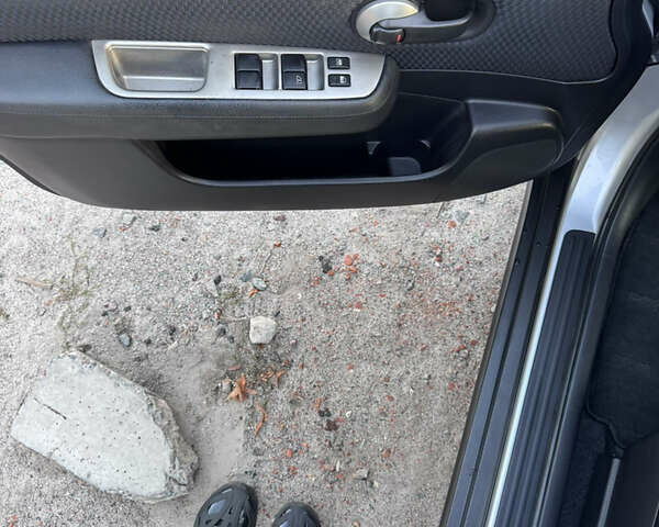 Серый Ниссан Тиида, объемом двигателя 1.5 л и пробегом 106 тыс. км за 8299 $, фото 10 на Automoto.ua