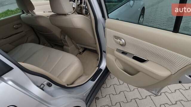 Серый Ниссан Тиида, объемом двигателя 1.6 л и пробегом 113 тыс. км за 6996 $, фото 14 на Automoto.ua