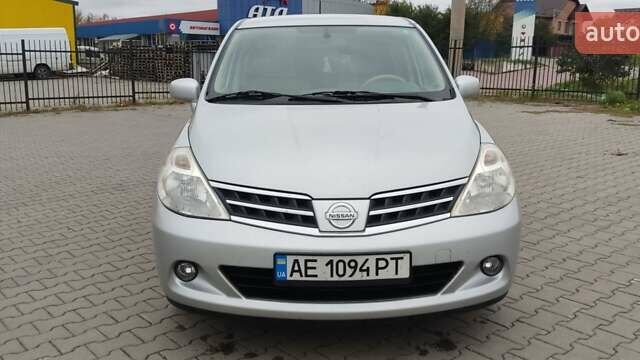 Серый Ниссан Тиида, объемом двигателя 1.6 л и пробегом 113 тыс. км за 6996 $, фото 2 на Automoto.ua