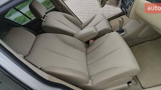 Серый Ниссан Тиида, объемом двигателя 1.6 л и пробегом 113 тыс. км за 6996 $, фото 16 на Automoto.ua