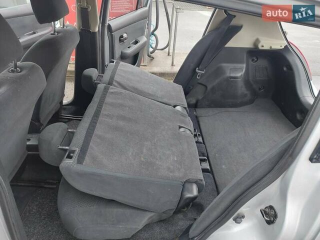 Серый Ниссан Тиида, объемом двигателя 1.6 л и пробегом 195 тыс. км за 7300 $, фото 12 на Automoto.ua