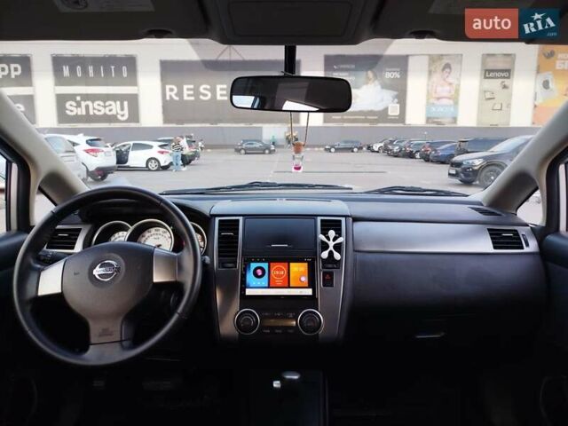 Сірий Ніссан Тііда, об'ємом двигуна 1.5 л та пробігом 81 тис. км за 7777 $, фото 11 на Automoto.ua