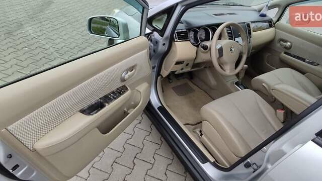 Серый Ниссан Тиида, объемом двигателя 1.6 л и пробегом 113 тыс. км за 6996 $, фото 8 на Automoto.ua