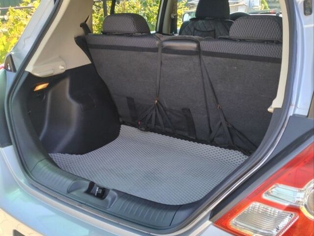 Сірий Ніссан Тііда, об'ємом двигуна 1.5 л та пробігом 150 тис. км за 7800 $, фото 11 на Automoto.ua