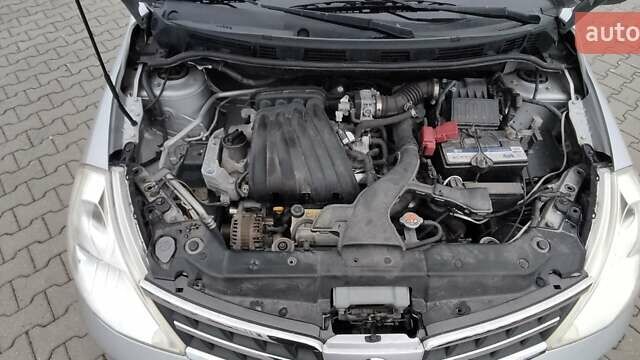 Серый Ниссан Тиида, объемом двигателя 1.6 л и пробегом 113 тыс. км за 6996 $, фото 18 на Automoto.ua