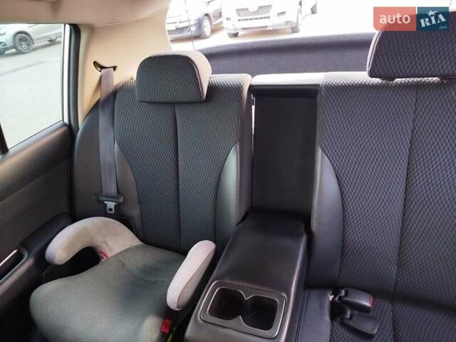 Сірий Ніссан Тііда, об'ємом двигуна 1.5 л та пробігом 81 тис. км за 7777 $, фото 9 на Automoto.ua