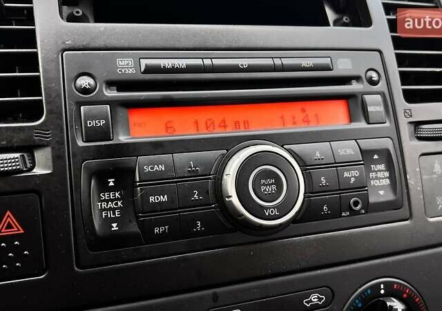 Серый Ниссан Тиида, объемом двигателя 1.6 л и пробегом 195 тыс. км за 7790 $, фото 23 на Automoto.ua