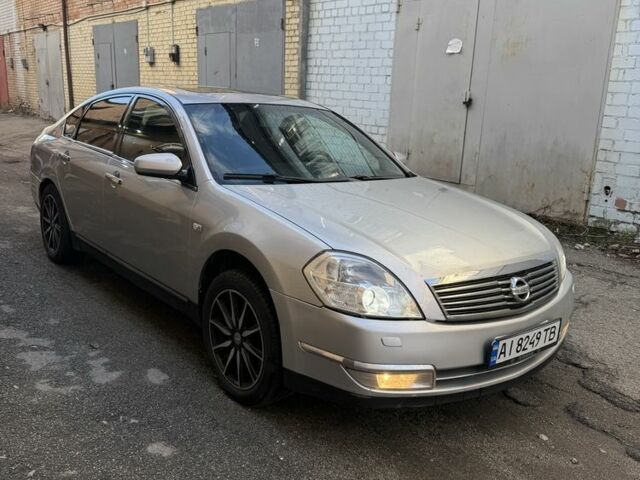 Серый Ниссан Тиида, объемом двигателя 2.4 л и пробегом 380 тыс. км за 4350 $, фото 6 на Automoto.ua