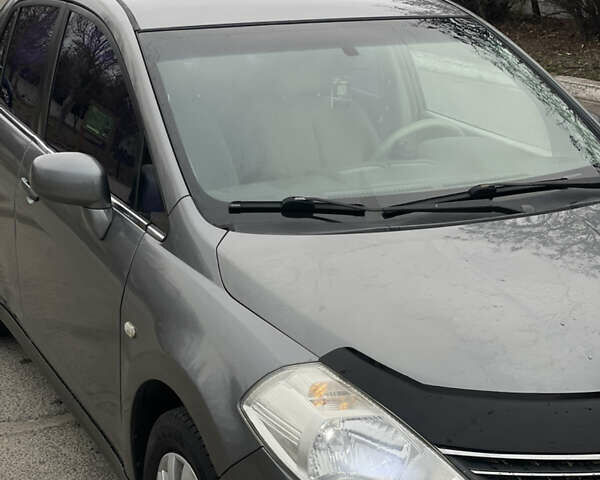 Сірий Ніссан Тііда, об'ємом двигуна 1.6 л та пробігом 220 тис. км за 4900 $, фото 7 на Automoto.ua