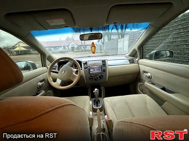 Серый Ниссан Тиида, объемом двигателя 1.6 л и пробегом 256 тыс. км за 4500 $, фото 9 на Automoto.ua