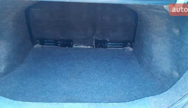 Сірий Ніссан Тііда, об'ємом двигуна 1.8 л та пробігом 199 тис. км за 4740 $, фото 4 на Automoto.ua