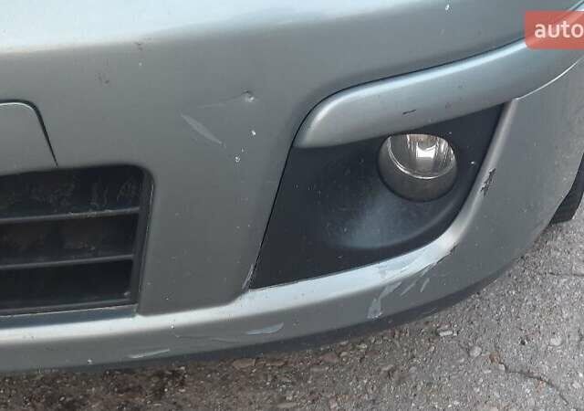 Сірий Ніссан Тііда, об'ємом двигуна 1.8 л та пробігом 199 тис. км за 4740 $, фото 8 на Automoto.ua