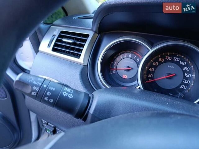 Серый Ниссан Тиида, объемом двигателя 1.8 л и пробегом 165 тыс. км за 5400 $, фото 17 на Automoto.ua