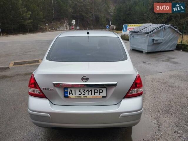 Сірий Ніссан Тііда, об'ємом двигуна 1.6 л та пробігом 45 тис. км за 8700 $, фото 10 на Automoto.ua