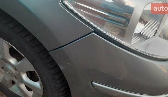 Сірий Ніссан Тііда, об'ємом двигуна 1.8 л та пробігом 199 тис. км за 4740 $, фото 7 на Automoto.ua