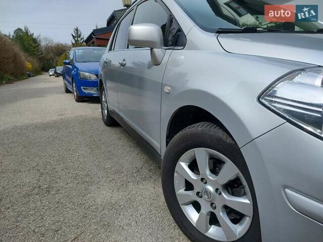 Сірий Ніссан Тііда, об'ємом двигуна 1.6 л та пробігом 45 тис. км за 8700 $, фото 28 на Automoto.ua