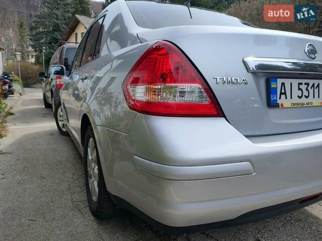 Сірий Ніссан Тііда, об'ємом двигуна 1.6 л та пробігом 45 тис. км за 8700 $, фото 35 на Automoto.ua