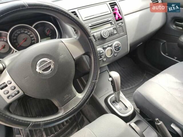 Сірий Ніссан Тііда, об'ємом двигуна 1.6 л та пробігом 45 тис. км за 8700 $, фото 48 на Automoto.ua