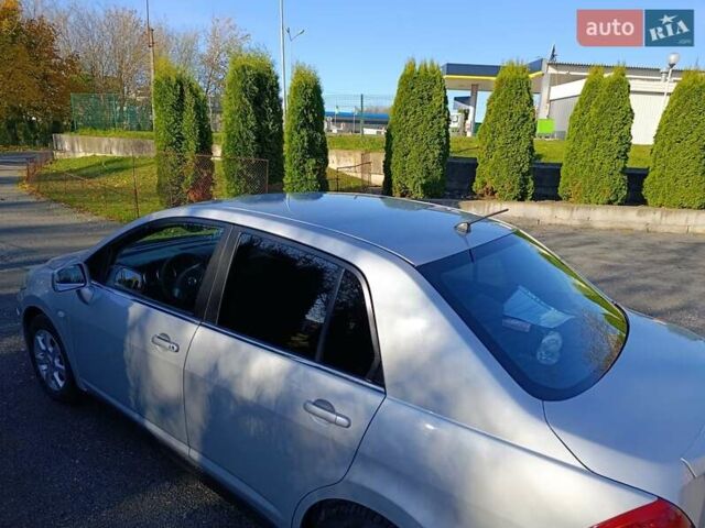 Серый Ниссан Тиида, объемом двигателя 1.8 л и пробегом 165 тыс. км за 5400 $, фото 4 на Automoto.ua