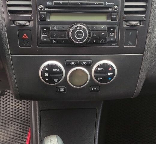 Сірий Ніссан Тііда, об'ємом двигуна 1.6 л та пробігом 300 тис. км за 4999 $, фото 7 на Automoto.ua