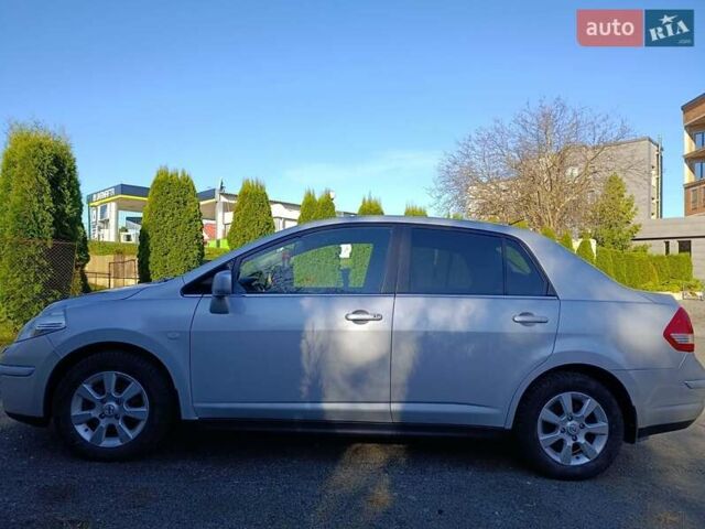 Серый Ниссан Тиида, объемом двигателя 1.8 л и пробегом 165 тыс. км за 5400 $, фото 2 на Automoto.ua