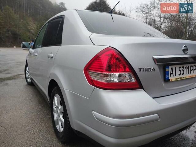 Сірий Ніссан Тііда, об'ємом двигуна 1.6 л та пробігом 45 тис. км за 8700 $, фото 11 на Automoto.ua