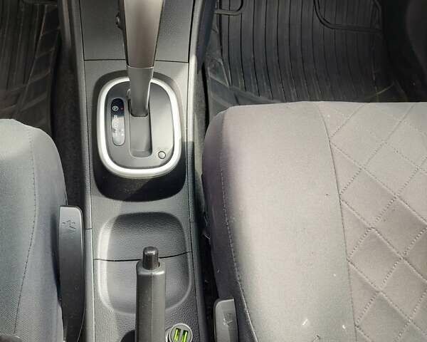 Сірий Ніссан Тііда, об'ємом двигуна 1.6 л та пробігом 45 тис. км за 8700 $, фото 22 на Automoto.ua