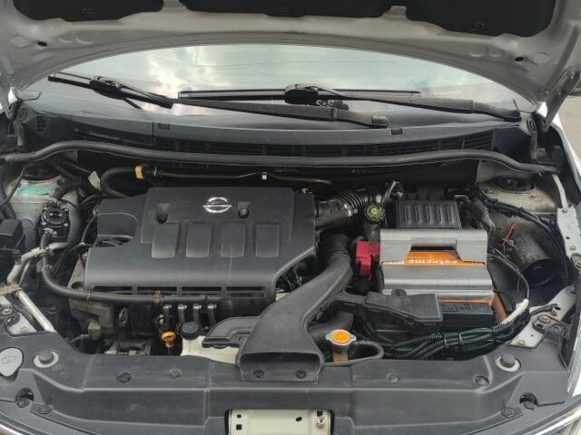 Сірий Ніссан Тііда, об'ємом двигуна 1.6 л та пробігом 300 тис. км за 4999 $, фото 6 на Automoto.ua