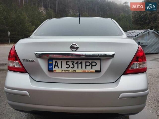 Сірий Ніссан Тііда, об'ємом двигуна 1.6 л та пробігом 45 тис. км за 8700 $, фото 4 на Automoto.ua