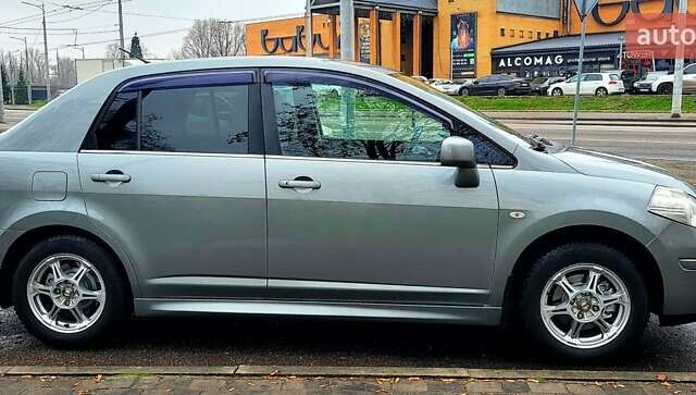 Серый Ниссан Тиида, объемом двигателя 1.6 л и пробегом 199 тыс. км за 5390 $, фото 13 на Automoto.ua