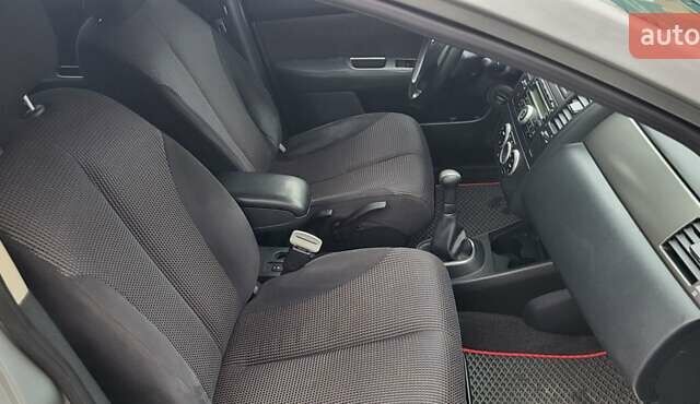 Серый Ниссан Тиида, объемом двигателя 1.6 л и пробегом 199 тыс. км за 5390 $, фото 29 на Automoto.ua