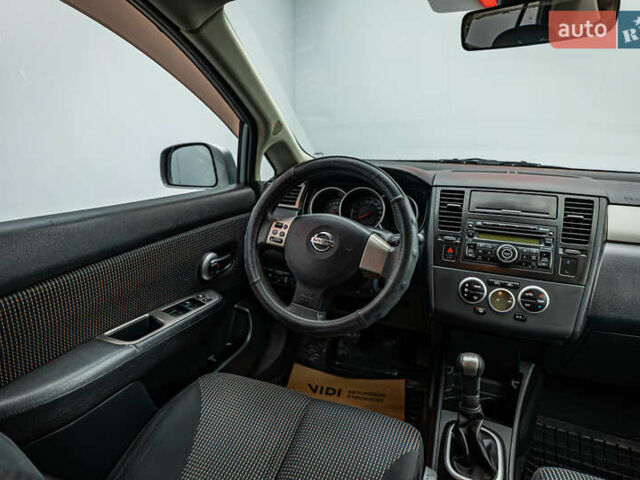 Серый Ниссан Тиида, объемом двигателя 1.6 л и пробегом 166 тыс. км за 6997 $, фото 10 на Automoto.ua