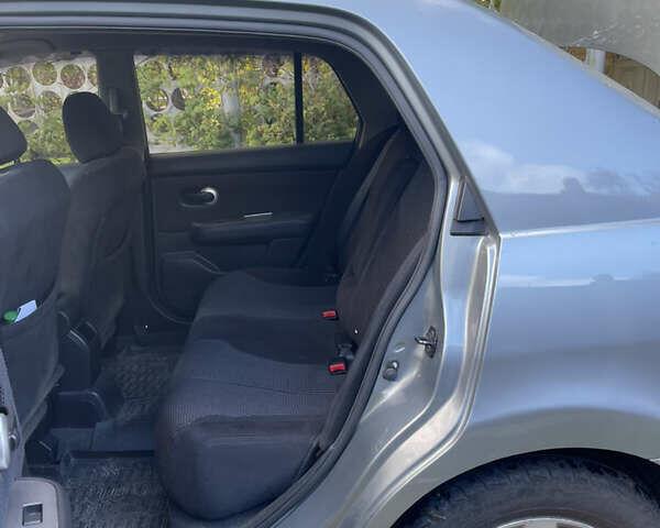 Серый Ниссан Тиида, объемом двигателя 1.6 л и пробегом 159 тыс. км за 6800 $, фото 18 на Automoto.ua