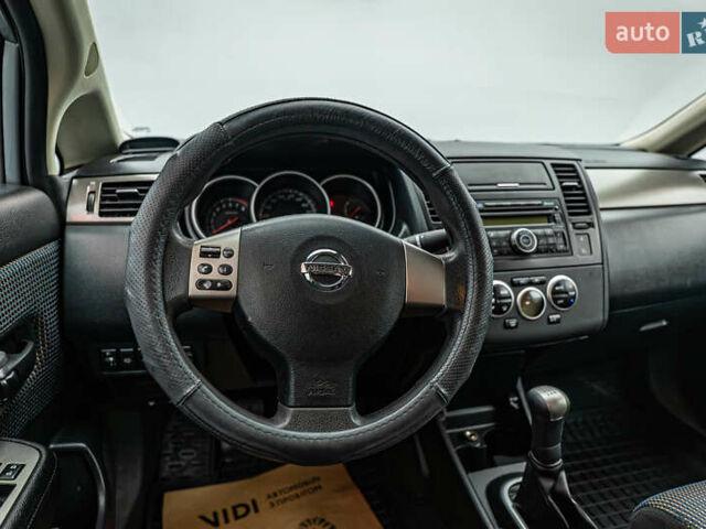 Серый Ниссан Тиида, объемом двигателя 1.6 л и пробегом 166 тыс. км за 6997 $, фото 11 на Automoto.ua