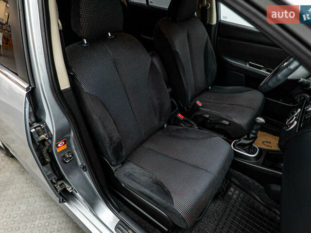 Серый Ниссан Тиида, объемом двигателя 1.6 л и пробегом 166 тыс. км за 6997 $, фото 18 на Automoto.ua