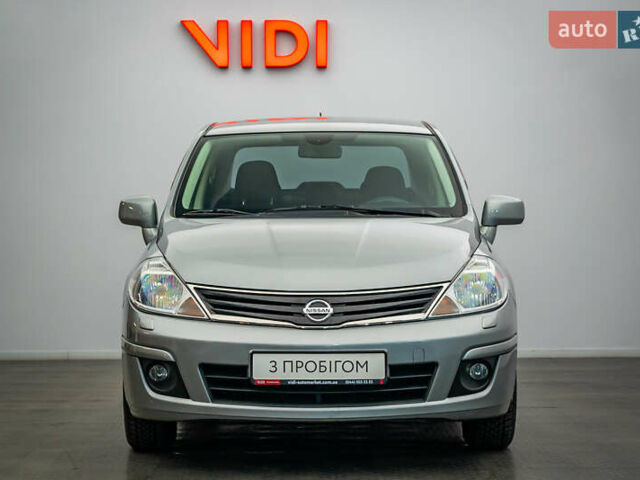Серый Ниссан Тиида, объемом двигателя 1.6 л и пробегом 166 тыс. км за 6997 $, фото 4 на Automoto.ua