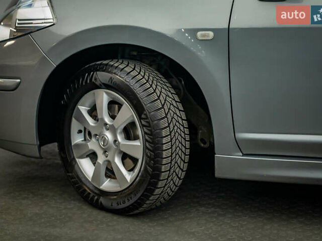 Серый Ниссан Тиида, объемом двигателя 1.6 л и пробегом 166 тыс. км за 6997 $, фото 7 на Automoto.ua