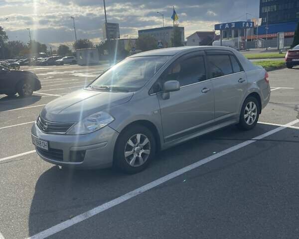 Серый Ниссан Тиида, объемом двигателя 1.6 л и пробегом 159 тыс. км за 6800 $, фото 3 на Automoto.ua