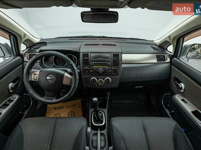 Серый Ниссан Тиида, объемом двигателя 1.6 л и пробегом 166 тыс. км за 6997 $, фото 9 на Automoto.ua