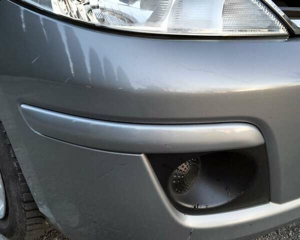 Серый Ниссан Тиида, объемом двигателя 1.6 л и пробегом 123 тыс. км за 7500 $, фото 3 на Automoto.ua