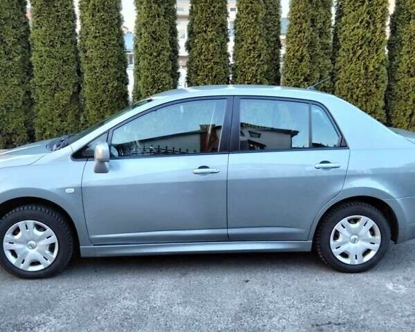 Серый Ниссан Тиида, объемом двигателя 1.6 л и пробегом 123 тыс. км за 7500 $, фото 10 на Automoto.ua