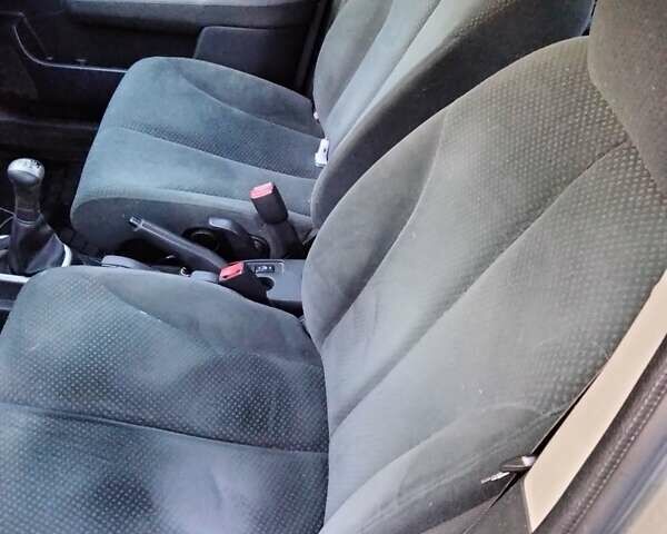 Серый Ниссан Тиида, объемом двигателя 1.6 л и пробегом 123 тыс. км за 7500 $, фото 8 на Automoto.ua