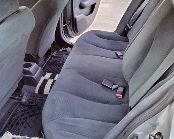 Серый Ниссан Тиида, объемом двигателя 1.6 л и пробегом 123 тыс. км за 7500 $, фото 12 на Automoto.ua