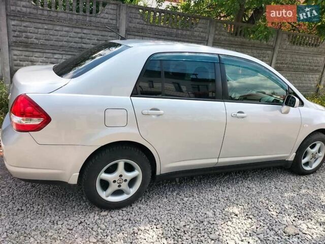 Серый Ниссан Тиида, объемом двигателя 1.5 л и пробегом 71 тыс. км за 6817 $, фото 7 на Automoto.ua