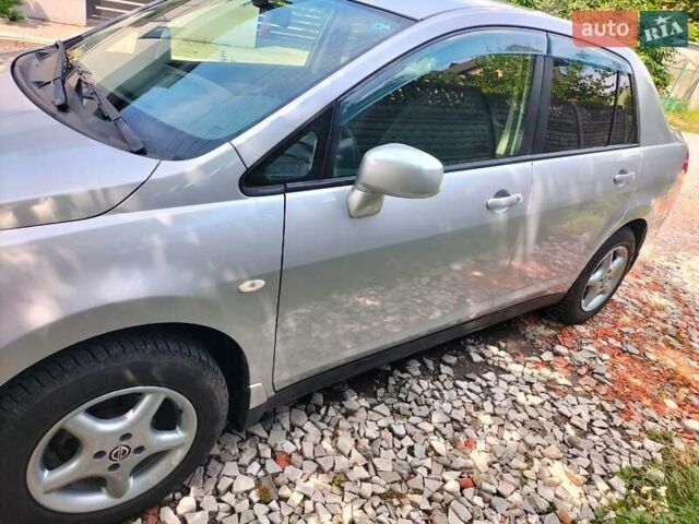 Серый Ниссан Тиида, объемом двигателя 1.5 л и пробегом 71 тыс. км за 6817 $, фото 8 на Automoto.ua