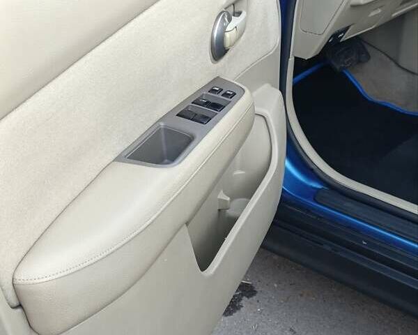 Синий Ниссан Тиида, объемом двигателя 1.6 л и пробегом 149 тыс. км за 6500 $, фото 21 на Automoto.ua