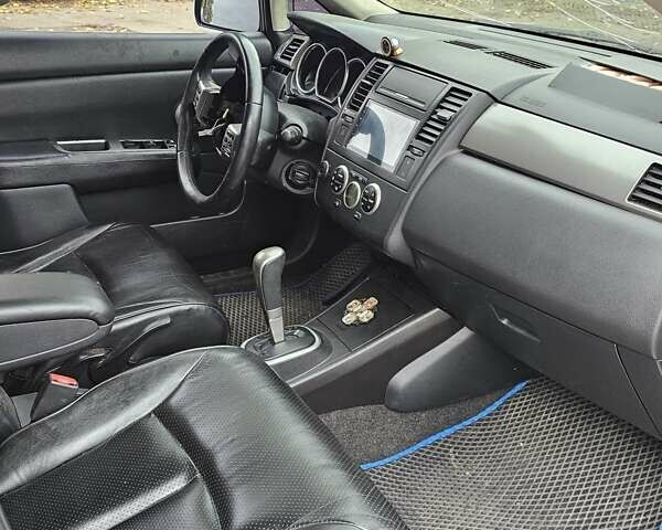 Синий Ниссан Тиида, объемом двигателя 1.6 л и пробегом 200 тыс. км за 2200 $, фото 17 на Automoto.ua