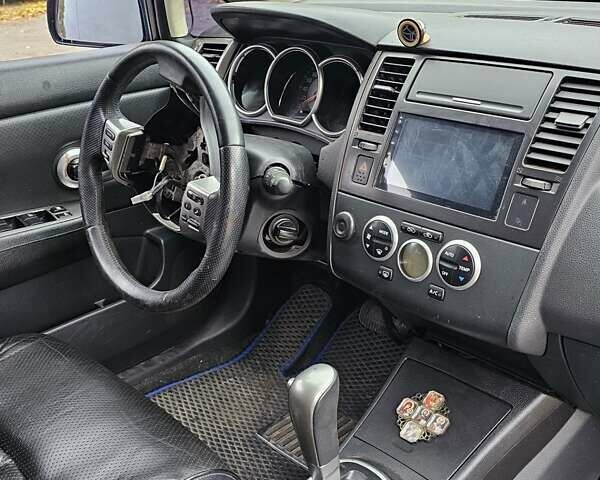 Синий Ниссан Тиида, объемом двигателя 1.6 л и пробегом 200 тыс. км за 2500 $, фото 16 на Automoto.ua