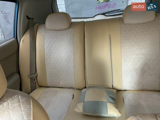 Синій Ніссан Тііда, об'ємом двигуна 1.6 л та пробігом 226 тис. км за 5700 $, фото 14 на Automoto.ua