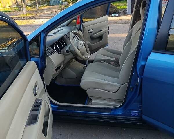 Синий Ниссан Тиида, объемом двигателя 1.6 л и пробегом 149 тыс. км за 6500 $, фото 25 на Automoto.ua
